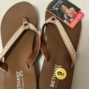 Ladies flip flops by Cobian.  New with tags.  Size 9